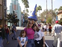 florida0037  Gemma attempts to wear the Wizard of Fantasia Hat with Amy and Rebecca.