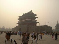 tiananmen  Early morning in Tian An Men square, Beijing. Even at this time (8:30 a.m.) it is sweltering hot and there is a very long queue for Mao's Mausoleum.